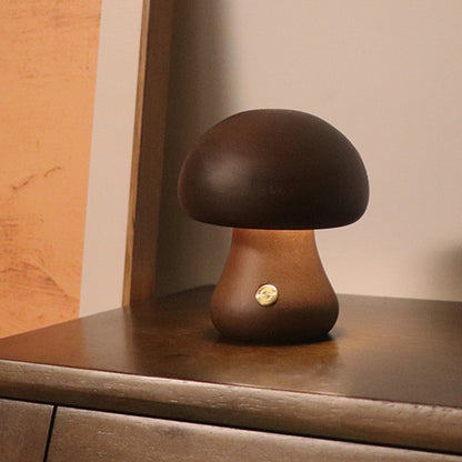 Wooden Mushroom LED Night Light featuring charming moss and jewelry accents. This creative and unique bedside table lamp adds a touch of nature-inspired warmth, perfect for bedroom or children's room decor. Crafted from beech/rubber wood, its personality-driven design enhances the ambiance with a blend of mushroom charm, mossy allure, and delicate jewelry detailing. Bring home this limited edition night light today for a touch of whimsical elegance in every corner.